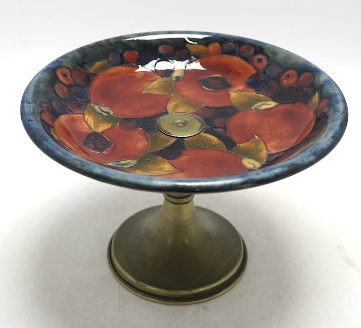 A Moorcroft Pomegranate comport, on plated metal pedestal, 14.5cm. Condition - fair, some wear to plating